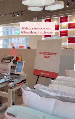 An in-store embroidery bar setup