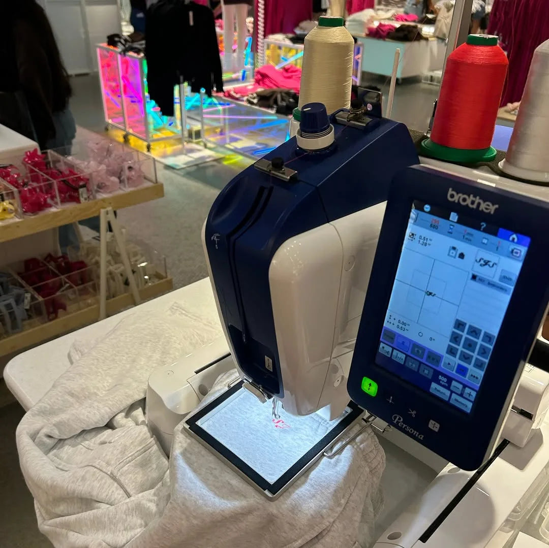 Embroidery machine and ordering kiosk at Garage
