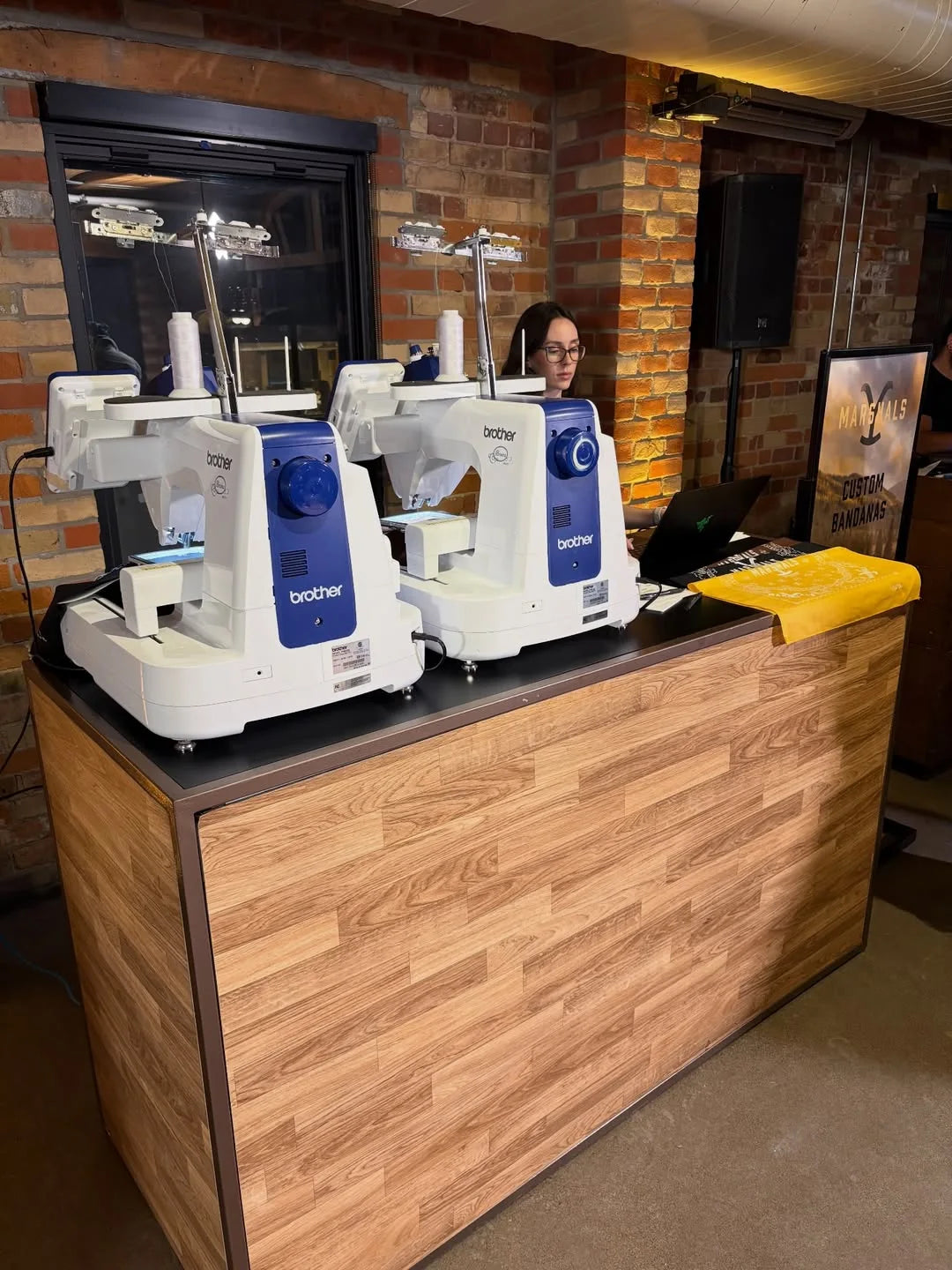 The live chain-stitch embroidery station at a TV series launch in Toronto