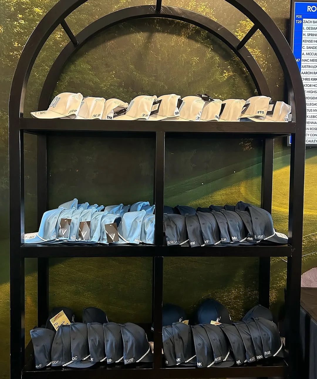 The merch wall at the embroidery station