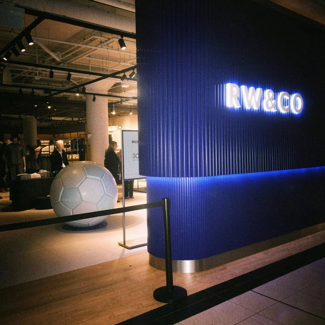 The illuminated RW&CO store at the Eaton Centre