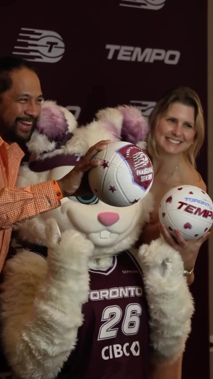 The Tempo mascot with guests and their finished balls