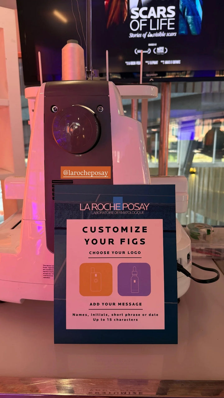 The FIGS customization menu beside the embroidery station.