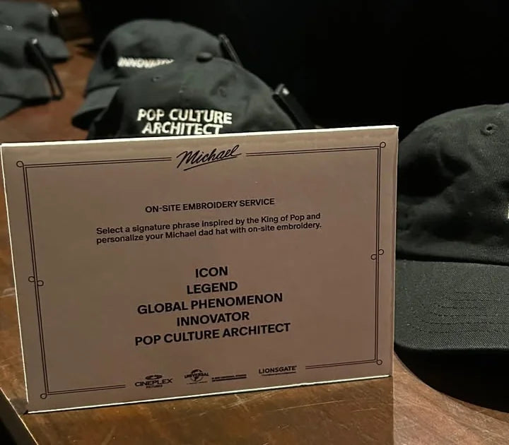 Black caps and an embroidery phrase menu at a movie pre-screening