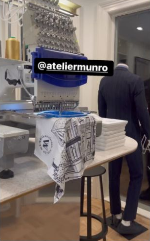 The embroidery machine and textiles at Atelier Munro Yorkville, captured from the archived Story preview.
