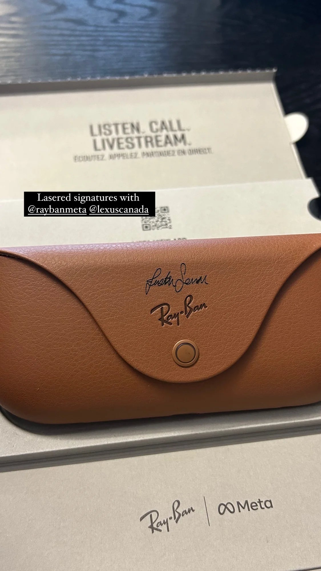 A Ray-Ban Meta case with a personalized signature above the Ray-Ban logo.