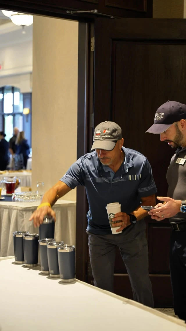 YETI tumblers at a golf-event engraving station